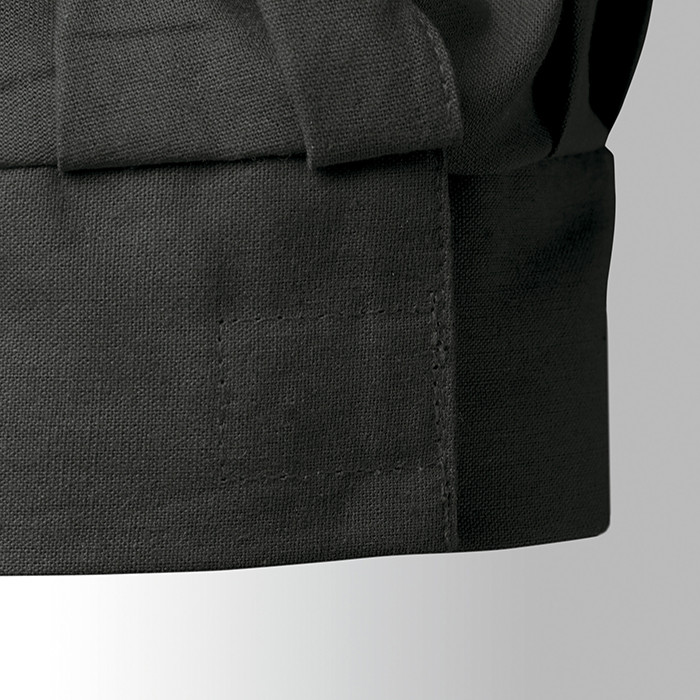 Dettaglio cappello da cuoco in cotone blu con chiusura in velcro