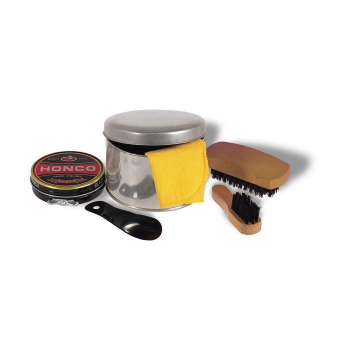 Set pulizia scarpe in confezione rotonda di metallo contenente spazzola, straccio e calzascarpe