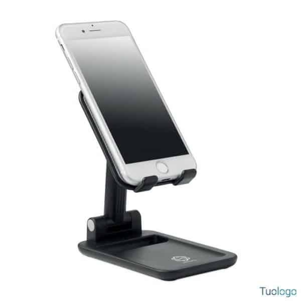 Supporto in plastica nera per smarphone da scrivania con telefono bianco posizionato inclinato con schermo nero spento