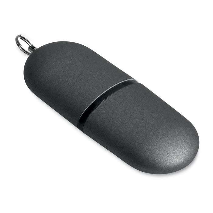 Chiavetta usb grigia scura a forma di capsula