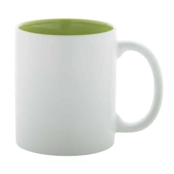 Tazza bianca in ceramica con interno verde