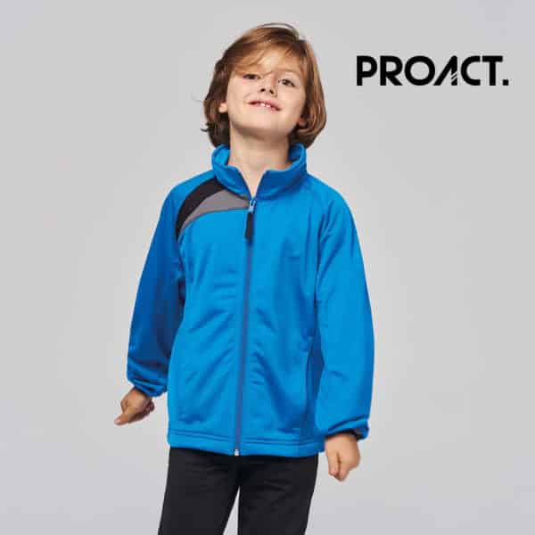 Bambino con maglia maniche lunghe blu 100% poliestere con zip tono su tono e polisini elasticizzati