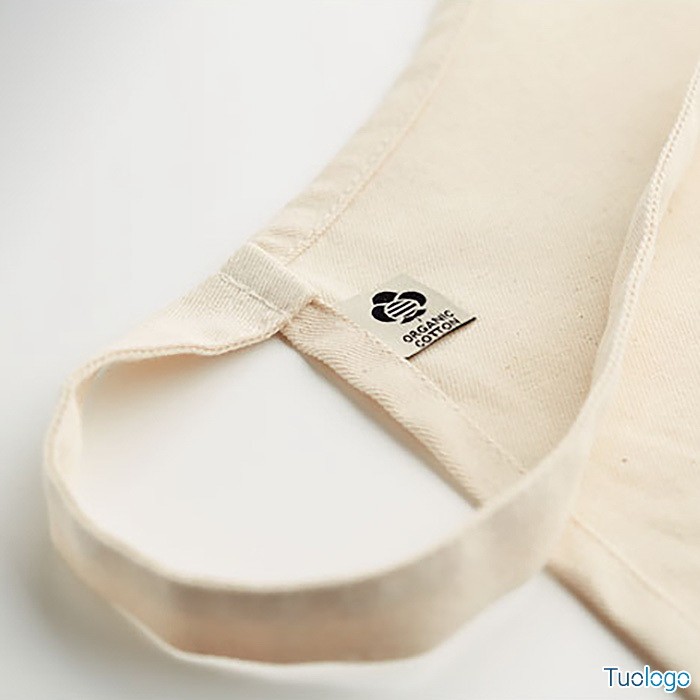 Dettaglio etichetta grembiule bianco