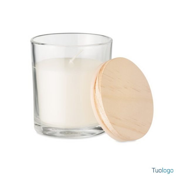 Candela profumata dentro vasetto di vetro con tappo in bamboo