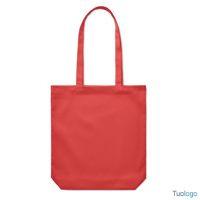 Shopper rossa con manici lunghi, su sfondo bianco