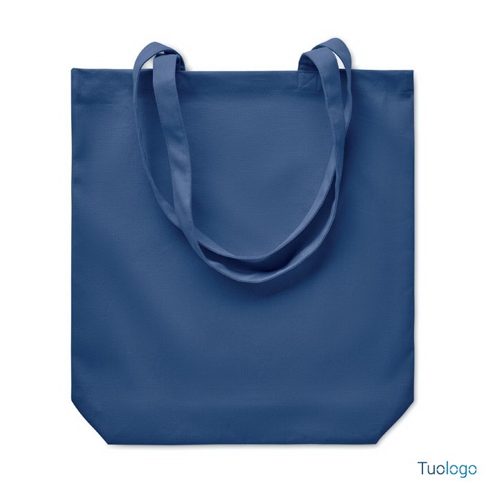 Shopper blu con manici lunghi, su sfondo bianco