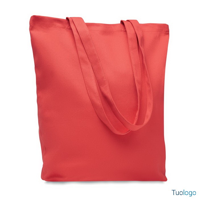 Shopper rossa con manici lunghi, su sfondo bianco