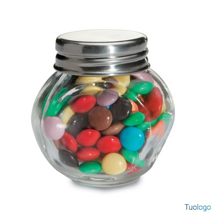 Barattolo in vetro con tappo metallico arancione contenente caramelle