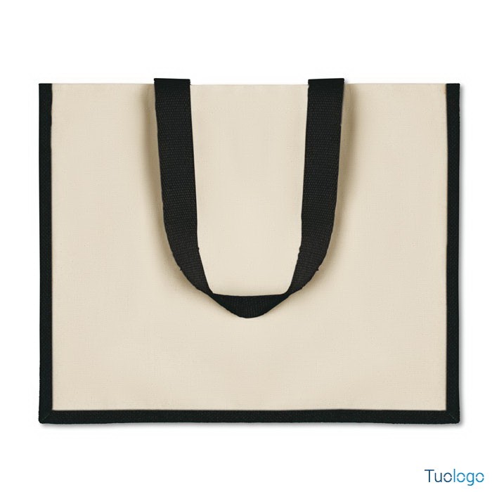 Shopper bianca con rifiniture e maniglia nera su sfondo bianco