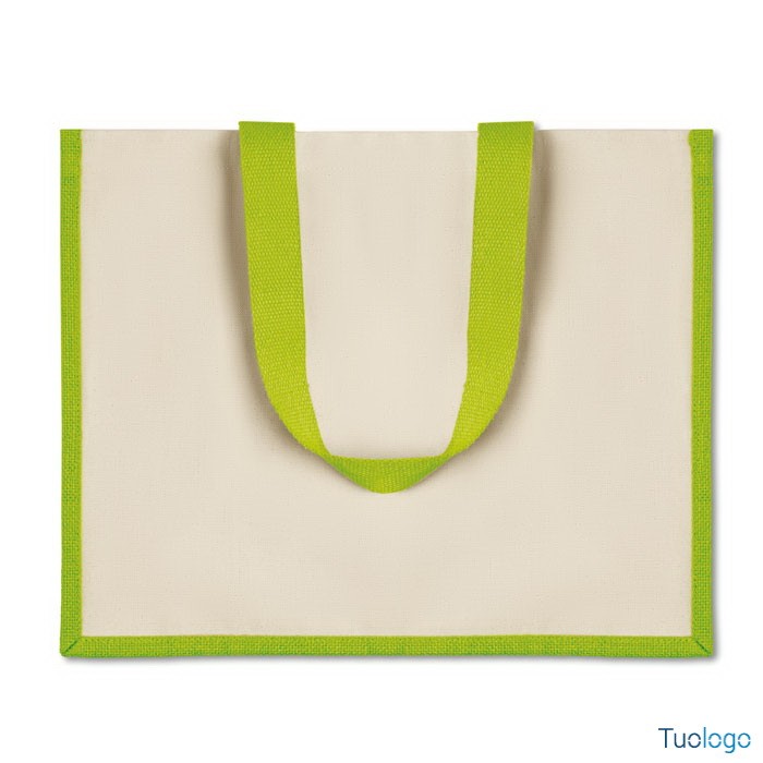 Shopper bianca con rifiniture e maniglia verde su sfondo bianco