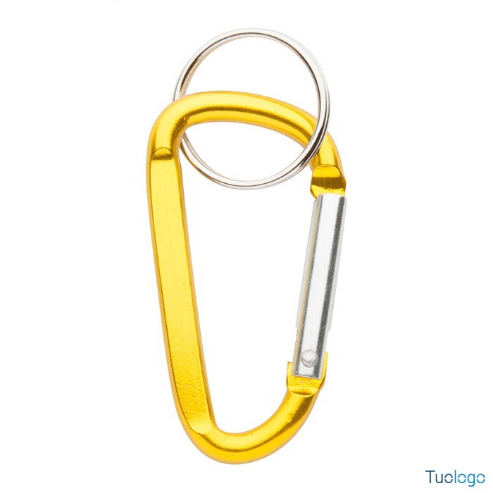 Moschettone giallo in alluminio con anello in metallo su un tavolo